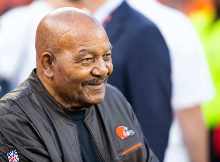 Browns Hall of Fame running back Jim Brown smiles on the sidelines before a 2019 game against the Rams.